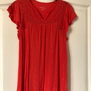Coral colored short-sleeve shirt from Target.